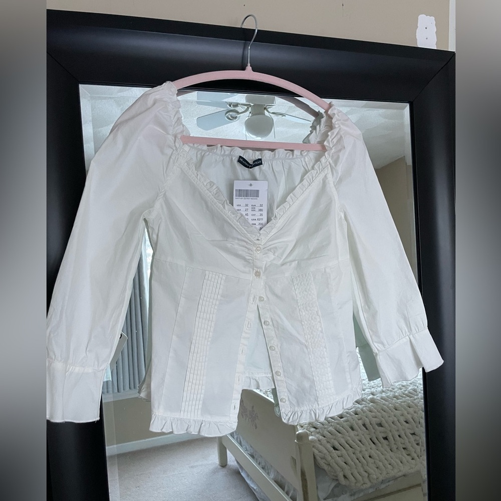 Brandy Melville white ruffle blouse